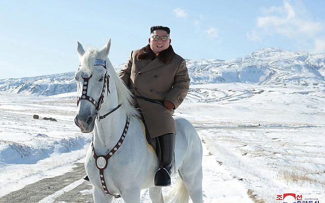 In this undated photo provided on October 16, 2019, by the North Korean government, North Korean leader Kim Jong Un rides a white horse to climb Mount Paektu, North Korea. (Korean Central News Agency/Korea News Service via AP)