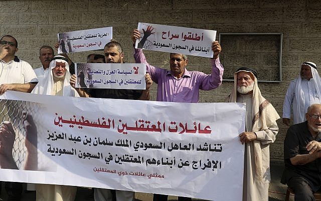 Families of Palestinians held in jails in Saudi Arabia hold placards in Arabic that some read, 'Release our sons in Saudi prisons,' and 'No for the policy of isolation and torture for the prisoners in Saudi jails' during a protest in front of the International Committee of the Red Cross office in Gaza, October 16, 2019. (AP Photo/Adel Hana) Families of Palestinians held in jails in Saudi Arabia hold placards in Arabic that some read, 'Release our sons in Saudi prisons,' and 'No for the policy of isolation and torture for the prisoners in Saudi jails' during a protest in front of the International Committee of the Red Cross office in Gaza, October 16, 2019. (AP Photo/Adel Hana)