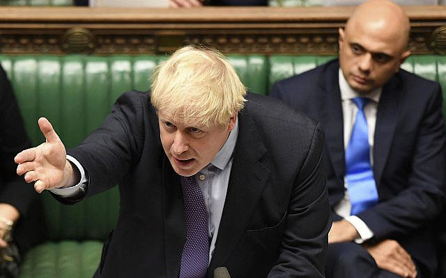 Britain's Prime Minister Boris Johnson speaks in the House of Commons in London during the debate for the EU Withdrawal Agreement Bill, on Oct. 22, 2019. (Jessica Taylor, UK Parliament via AP) Britain's Prime Minister Boris Johnson speaks in the House of Commons in London during the debate for the EU Withdrawal Agreement Bill, on Oct. 22, 2019. (Jessica Taylor, UK Parliament via AP)