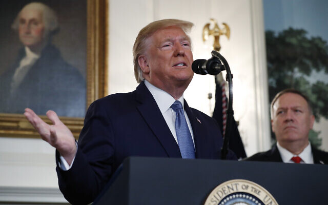 US President Donald Trump, accompanied by Secretary of State Mike Pompeo, speaks October 23, 2019, in the Diplomatic Room of the White House in Washington. (AP Photo/ Jacquelyn Martin) US President Donald Trump, accompanied by Secretary of State Mike Pompeo, speaks October 23, 2019, in the Diplomatic Room of the White House in Washington. (AP Photo/ Jacquelyn Martin)