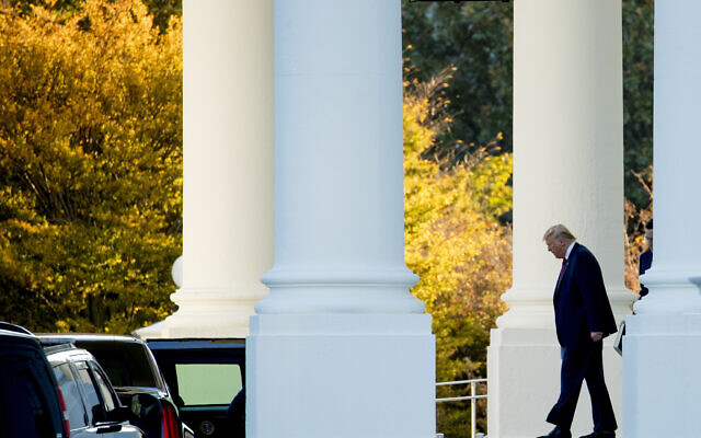 US President Donald Trump walks out of the North Portico of the White House in Washington, Monday, Oct. 28, 2019, to travel to Andrews Air Force Base, Md., and then on to Chicago. (AP Photo/Andrew Harnik) US President Donald Trump walks out of the North Portico of the White House in Washington, Monday, Oct. 28, 2019, to travel to Andrews Air Force Base, Md., and then on to Chicago. (AP Photo/Andrew Harnik)