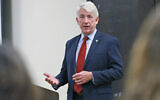 Virginia Attorney General Mark Herring talks with University of Richmond students at the school in Richmond, Virginia, October 4, 2017. (AP Photo/Steve Helber)