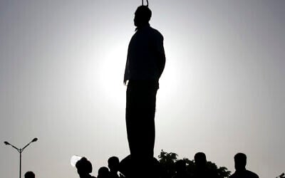 In this May 26, 2011 file photo, the body of convicted man Mahdi Faraji hangs at the city of Qazvin about 80 miles (130 kilometers) west of the capital Tehran, Iran. (AP Photo/Mehr News Agency, Hamideh Shafieeha,)