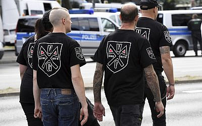 Far-right extremists gather to commemorate the death of Adolf Hitler's deputy, Rudolf Hess, in Berlin's western district of Spandau, Saturday, Aug. 19, 2017. (Maurizio Gambarini/dpa via AP)