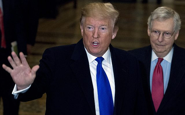 President Donald Trump accompanied by Senate Majority Leader Mitch McConnell of Ky., right, arrives for a Senate Republican policy lunch on Capitol Hill in Washington, Tuesday, March 26, 2019. (AP Photo/Jose Luis Magana) President Donald Trump accompanied by Senate Majority Leader Mitch McConnell of Ky., right, arrives for a Senate Republican policy lunch on Capitol Hill in Washington, Tuesday, March 26, 2019. (AP Photo/Jose Luis Magana)