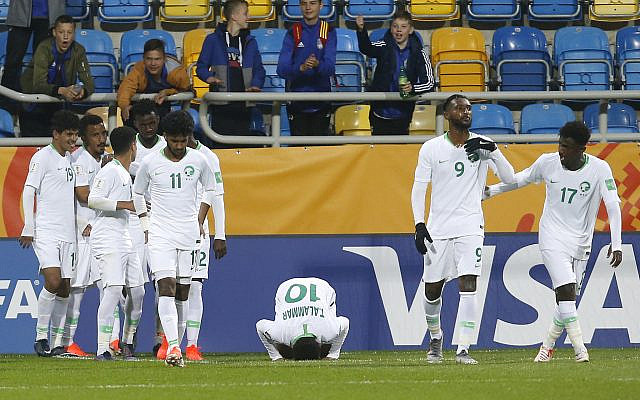 Team Saudi Arabia celebrates after Saudi Arabia's Hassan Altambakti scored his side's second goal during the Group E U20 World Cup soccer match between Saudi Arabia and Mali in Gdynia, Poland, May 28, 2019. (Darko Vojinovic/AP) Team Saudi Arabia celebrates after Saudi Arabia's Hassan Altambakti scored his side's second goal during the Group E U20 World Cup soccer match between Saudi Arabia and Mali in Gdynia, Poland, May 28, 2019. (Darko Vojinovic/AP)