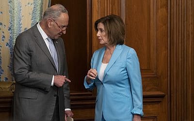 Senate Minority Leader Chuck Schumer left, talks with House Speaker Nancy Pelosi, before a House vote at the Capitol in Washington, June 26, 2019. (AP Photo/J. Scott Applewhite)