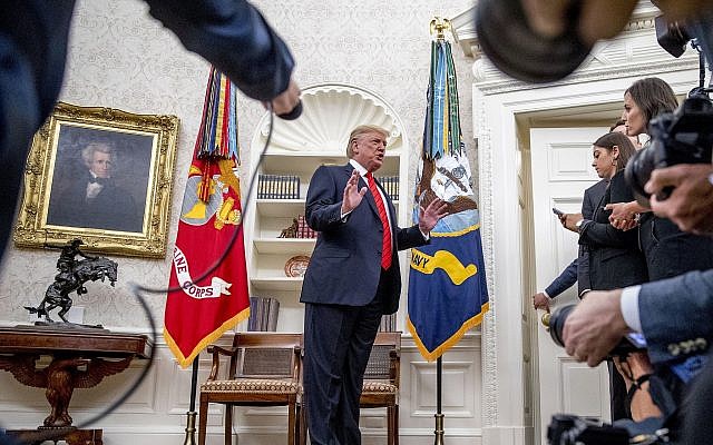 President Donald Trump stops to take a question from NBC Chief White House Correspondent Hallie Jackson, right, as he departs a ceremonial swearing in ceremony for new Labor Secretary Eugene Scalia in the Oval Office of the White House in Washington, Monday, Sept. 30, 2019. (AP/Andrew Harnik) President Donald Trump stops to take a question from NBC Chief White House Correspondent Hallie Jackson, right, as he departs a ceremonial swearing in ceremony for new Labor Secretary Eugene Scalia in the Oval Office of the White House in Washington, Monday, Sept. 30, 2019. (AP/Andrew Harnik)