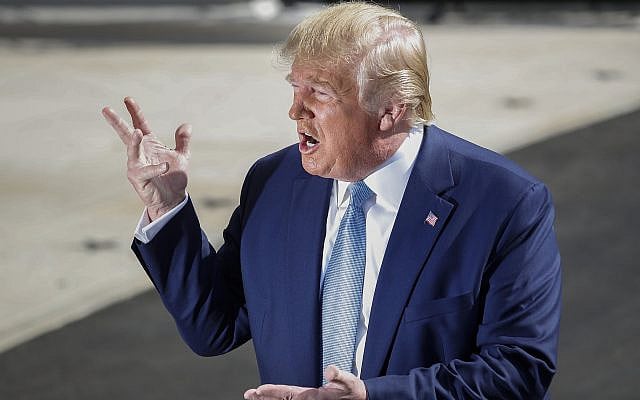 US President Donald Trump gestures while speaking to the media on the South Lawn of the White House in Washington, October 4, 2019. (Pablo Martinez Monsivais/AP) US President Donald Trump gestures while speaking to the media on the South Lawn of the White House in Washington, October 4, 2019. (Pablo Martinez Monsivais/AP)