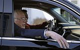 Democratic presidential candidate Sen. Bernie Sanders, I-Vt., departs Burlington International Airport after disembarking from a plane in South Burlington, Vt., on Saturday, Oct. 5, 2019. Sanders is back home in Vermont after being treated for a heart attack in Las Vegas. (AP Photo/Steven Senne)