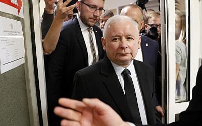 The ruling party leader Jaroslaw Kaczynski leaves polling station after his vote in Warsaw, Poland, Sunday, Oct. 13, 2019 (AP Photo/Darko Bandic)