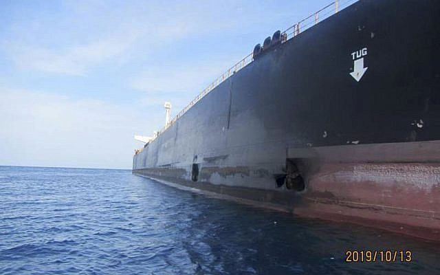 This photo taken on Sunday, Oct. 13, 2019, and released by the official news agency of the Iranian Oil Ministry, SHANA, shows the scene of damage by two missiles that allegedly struck the Iranian oil tanker Sabiti, at the Red Sea. (SHANA via AP) This photo taken on Sunday, Oct. 13, 2019, and released by the official news agency of the Iranian Oil Ministry, SHANA, shows the scene of damage by two missiles that allegedly struck the Iranian oil tanker Sabiti, at the Red Sea. (SHANA via AP)