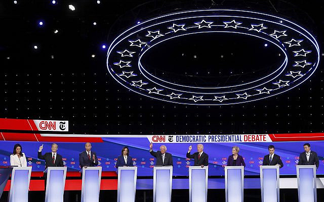 Candidates participate in a Democratic presidential primary debate hosted by CNN/New York Times at Otterbein University, October 15, 2019, in Westerville, Ohio. (John Minchillo/AP) Candidates participate in a Democratic presidential primary debate hosted by CNN/New York Times at Otterbein University, October 15, 2019, in Westerville, Ohio. (John Minchillo/AP)