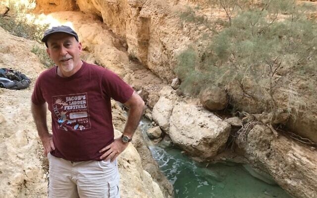 Alon Tal pictured standing above the Bokek stream near the Dead Sea. (Courtesy)