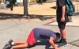 A Jewish boy allegedly being forced to kiss a classmate's feet is causing outrage in Australia. (Twitter via JTA)