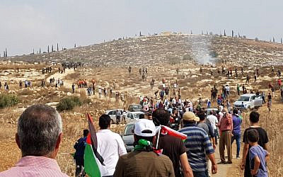 Palestinians gather during a protest march dispersed by the IDF near the Shiloh settlement on October 17, 2019. (Sharona Weiss/Yesh Din)