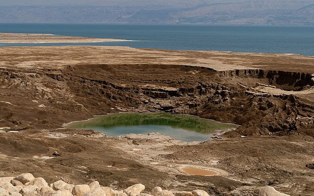 View of a sinkhole near the Dead Sea, southern Israel, October 4, 2018 . Sinkholes are a result of the continuing sea level drop of the Dead Sea.(Yaniv Nadav/FLASH90)