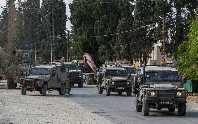 Israeli soldiers seen during a raid in the village of Shuweika, near the West Bank town of Tulkarem, October 20, 2018. (Nasser Ishtayeh/Flash90)