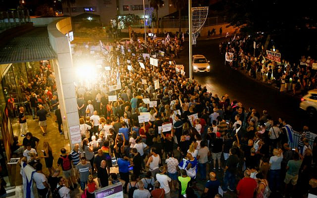Illustrative: Protests near the home of Attorney General Avichai Mandelblit in Petah Tikva on August 17, 2019 (Roy Alima/Flash90) Illustrative: Protests near the home of Attorney General Avichai Mandelblit in Petah Tikva on August 17, 2019 (Roy Alima/Flash90)