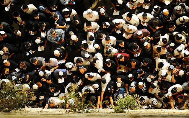 Tens of thousands pray for forgivness (Selichot), at the Western Wall in the Old City of Jerusalem on early on September 27, 2019. (Mendy Hechtman/Flash90) Tens of thousands pray for forgivness (Selichot), at the Western Wall in the Old City of Jerusalem on early on September 27, 2019. (Mendy Hechtman/Flash90)