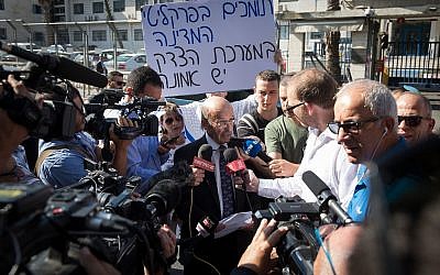 Prime Minister Benjamin Netanyahu's attorney Ram Caspi arrives at the Justice Ministry in Jerusalem for a pre-indictment hearing on the prime minister's corruption investigations, on October 2, 2019. (Noam Revkin Fenton/Flash90)