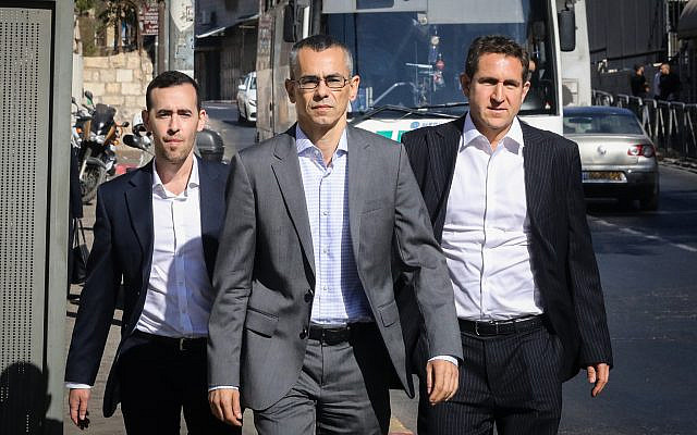 Prime Minister Benjamin Netanyahu's attorneys arrive at the Justice Ministry in Jerusalem for a pre-indictment hearing on October 3, 2019. (Yossi Zamir/Flash90)