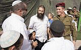 Maj. Gen. Nadav Padan, Head of the IDF Central Command, at a protest by Yitzhar residents in support of IDF soldiers at the entrance to the Samaria Brigade, October 20, 2019, following the assault on IDF soldiers in the settlement of Yitzhar during the night. (Sraya Diamant/Flash90)