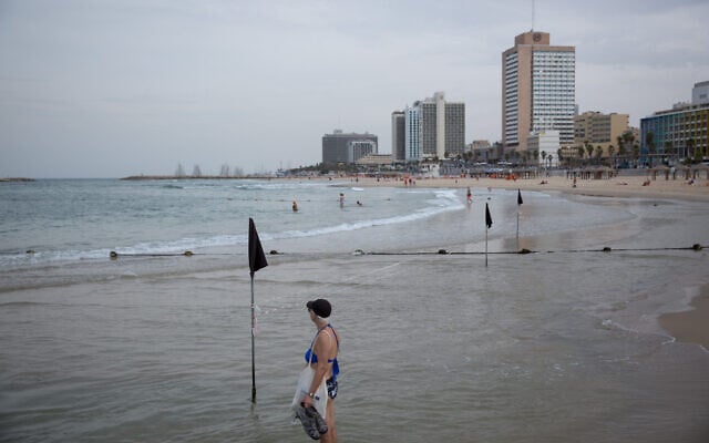A beach in Tel Aviv is nearly empty as temperatures drop across Israel, October 23, 2019. (Miriam Alster/Flash90) A beach in Tel Aviv is nearly empty as temperatures drop across Israel, October 23, 2019. (Miriam Alster/Flash90)