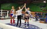 Yulia Sachkov (R) celebrates after winning a gold medal at the world kickboxing championships in Sarajevo, Bosnia, October 26, 2019. (Ayelet Federation on Non-Olympic Sport in Israel)