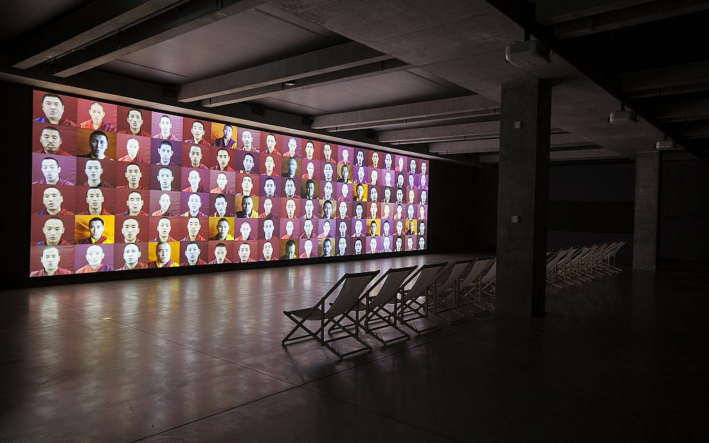 'Waterfall,' a video installation by Marina Abramovic in the historic YMCA indoor pool, as part of the 4th Jerusalem Biennale (Courtesy of the Marina Abramovic Archives and MONA)