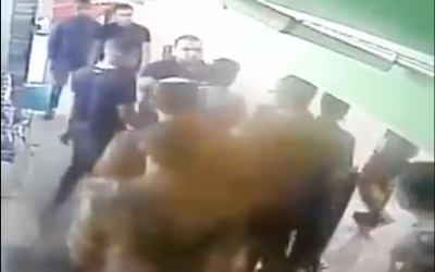 Soldiers from the IDF Netzah Yehuda battalion argue with Bedouin men before fighting with them at a gas station in southern Israel on October 17, 2019. (Screen capture)