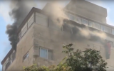 A fire in an apartment on Ben Yehuda Street in central Jerusalem, October 16, 2019. (Screenshot: YouTube)