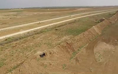 Newly constructed earthworks and sniper posts on the Gaza border in footage broadcast by Channel 13 on October 9, 2019. (Screenshot)