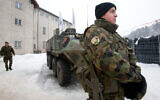 Illustrative: Soldiers guard a power plant near Kueblis, Switzerland, Jan. 27, 2009. (AP Photo/Keystone, Ennio Leanza)