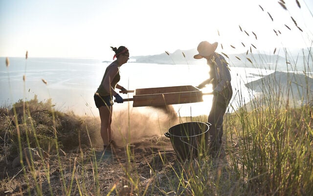 Researchers screen for finds at the Stelida, archaeological site in Greece in 2017. (Jason Lau/courtesy) Researchers screen for finds at the Stelida, archaeological site in Greece in 2017. (Jason Lau/courtesy)