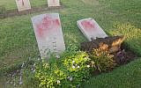 Vandalized graves in a Commonwealth military cemetery in Haifa, October 11, 2019. (Israel police)