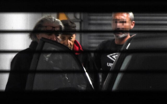 Claude Sinke (R), the octogenarian accused of wounding two men in a shooting at a mosque in southern France and his lawyer Benoit Briffe (L) enter a police car before leaving the Bayonne courthouse on October 30, 2019 where Sinke was charged and ordered held in detention. (Gaizka Iroz/AFP) Claude Sinke (R), the octogenarian accused of wounding two men in a shooting at a mosque in southern France and his lawyer Benoit Briffe (L) enter a police car before leaving the Bayonne courthouse on October 30, 2019 where Sinke was charged and ordered held in detention. (Gaizka Iroz/AFP)