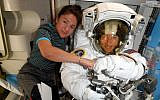 In this image released by NASA on October 4, 2019, astronauts Christina Koch, right, and, Jessica Meir, left, pose on the International Space Station. (NASA via AP)