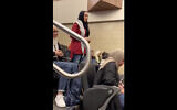 Ayah Ali speaking at Benedictine University in Lisle, Ill. (Screenshot/Benedictine SJP/Twitter via JTA)