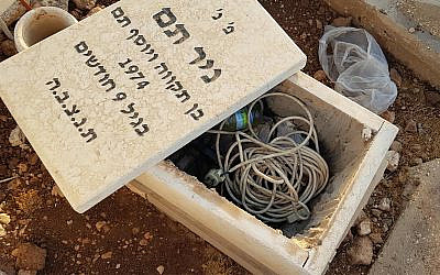 Cooking gear found under the gravestone of a nine-month old in Rosh Ha'ayin, October 7, 2019. (Facebook)