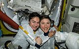 US astronauts Jessica Meir, left, and Christina Koch, right, pose for a photo in the International Space Station, October 18, 2019. (NASA via AP)