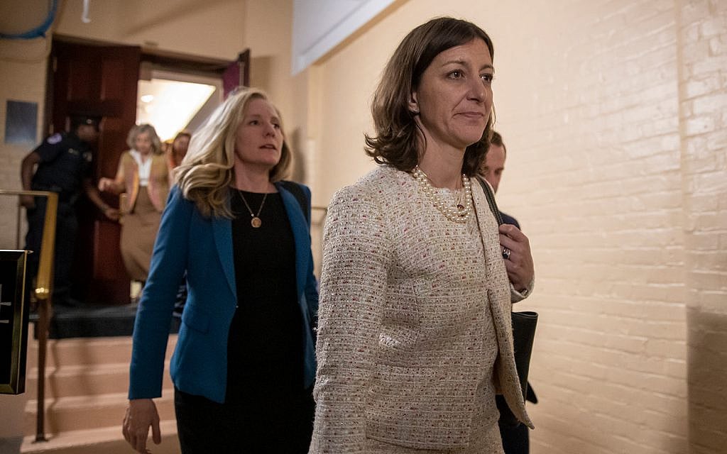 Representative Elaine Luria, right, followed by Representative Abigail Spanberger, left, leave a House Democratic Caucus meeting with Speaker of the House Nancy Pelosi where she was persuaded to launch a formal impeachment inquiry against US President Donald Trump, at the Capitol in Washington, September 24, 2019. (AP Photo/J. Scott Applewhite) Representative Elaine Luria, right, followed by Representative Abigail Spanberger, left, leave a House Democratic Caucus meeting with Speaker of the House Nancy Pelosi where she was persuaded to launch a formal impeachment inquiry against US President Donald Trump, at the Capitol in Washington, September 24, 2019. (AP Photo/J. Scott Applewhite)