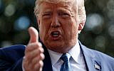 US President Donald Trump talks to reporters on the South Lawn of the White House, October 4, 2019, in Washington. (AP Photo/Evan Vucci)