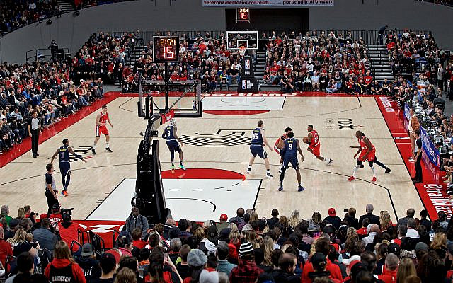 The Portland Trail Blazers play against the Denver Nuggets in a preseason game in Portland, Oregon, Oct. 8, 2019. (AP Photo/Craig Mitchelldyer) The Portland Trail Blazers play against the Denver Nuggets in a preseason game in Portland, Oregon, Oct. 8, 2019. (AP Photo/Craig Mitchelldyer)