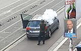 An armed man fires on a street in Halle, Germany, following a shooting outside a synagogue in that city which killed two. (Screenshot/Andreas Splett/ATV-Studio Halle/AFP)