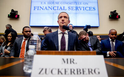 Facebook CEO Mark Zuckerberg arrives for a House Financial Services Committee hearing on Capitol Hill in Washington, October 23, 2019, on Facebook's impact on the financial services and housing sectors. (AP Photo/Andrew Harnik)