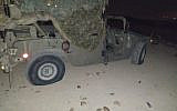 Illustrative: A military jeep is damaged in riots by settlers near the West Bank settlement of Yitzhar on October 20, 2019. (Courtesy)
