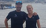 Israeli windsurfer Katy Spychakov (R) and her coach Pierre Loquet. (Israel Sailing Association)