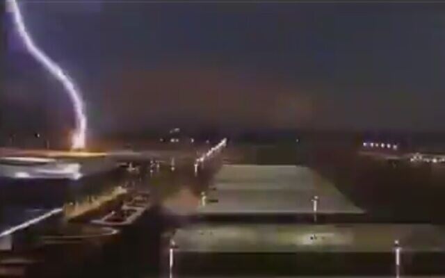 Lightning striking the Ramon Airport in southern Israel on October 27, 2019. (screen capture: Twitter/Ofer Lefler) Lightning striking the Ramon Airport in southern Israel on October 27, 2019. (screen capture: Twitter/Ofer Lefler)