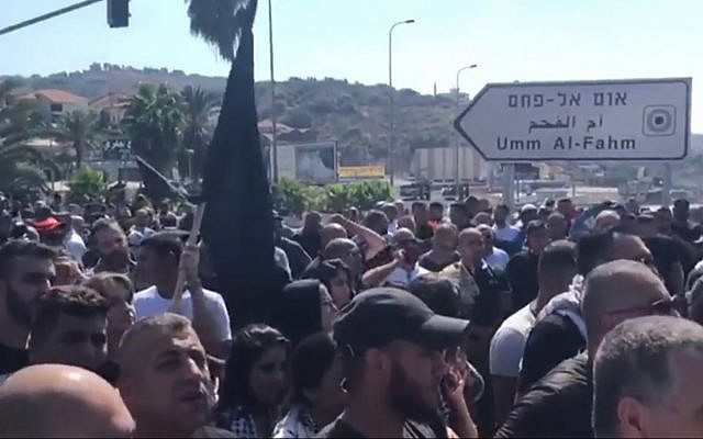 Thousands of Arab Israelis protest violence in the community and perceived government and police inaction on the issue, October 4, 2019 (Screen grab via Channel 13) Thousands of Arab Israelis protest violence in the community and perceived government and police inaction on the issue, October 4, 2019 (Screen grab via Channel 13)